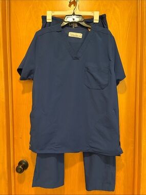 Classic Women's Navy Scrub Set with V-Neck Top and Drawstring Pants